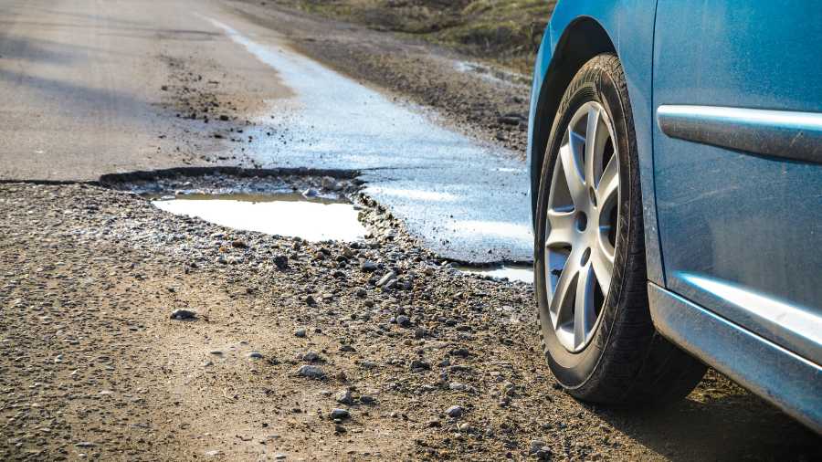 run-down-roads-pot-holes-in-england image run down roads
